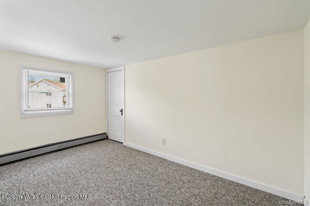 252-254 Partition Street Saugerties, NY 12477 - Photo 12 of 35 an empty room with windows