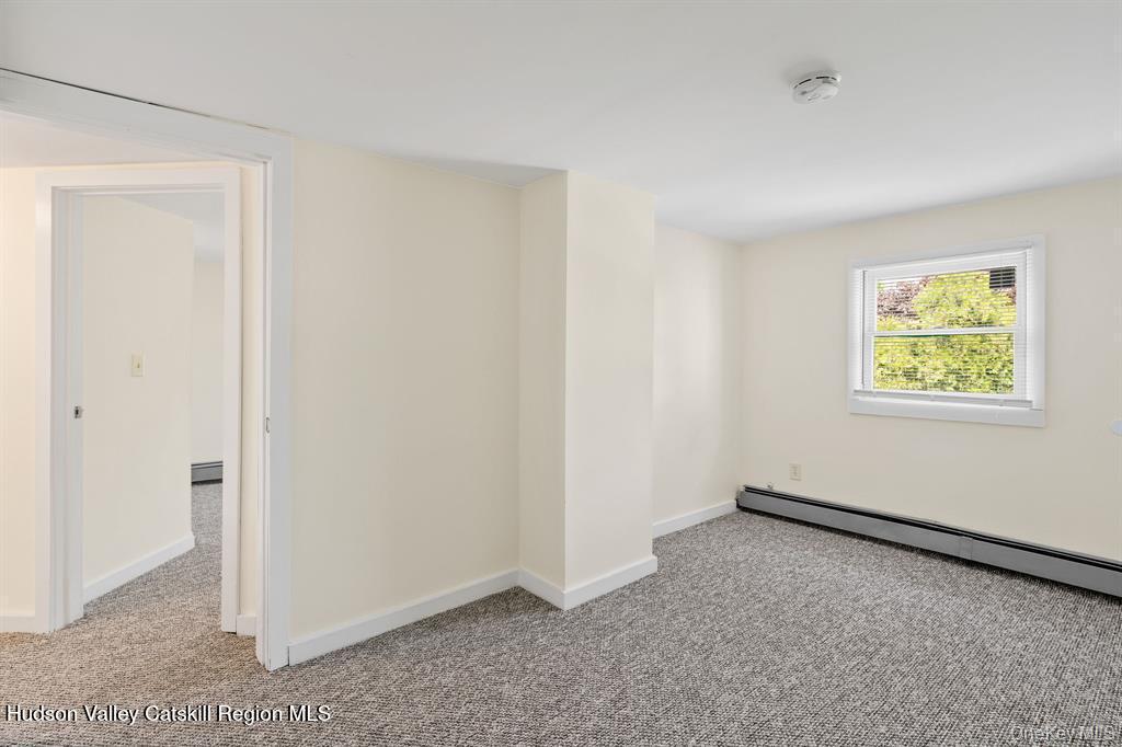 252-254 Partition Street Saugerties, NY 12477 - Photo 13 of 35 an empty room with windows
