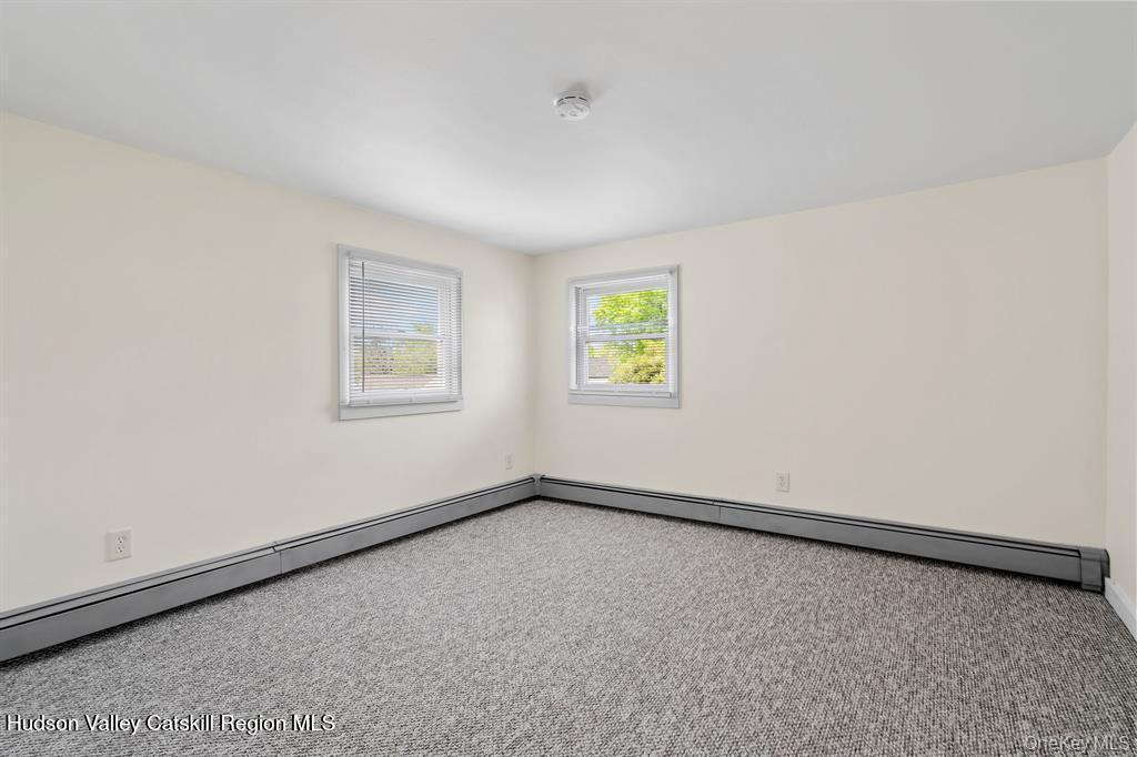 252-254 Partition Street Saugerties, NY 12477 - Photo 15 of 35 an empty room with windows