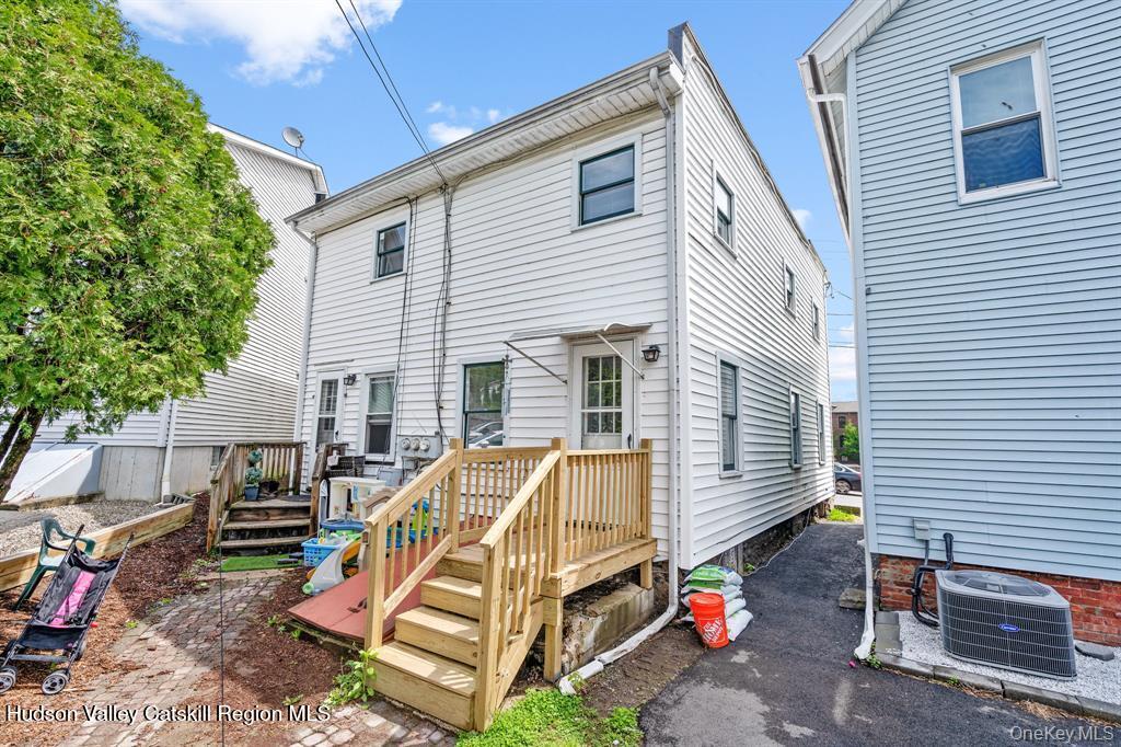 252-254 Partition Street Saugerties, NY 12477 - Photo 35 of 35 a view of a house with backyard and chairs