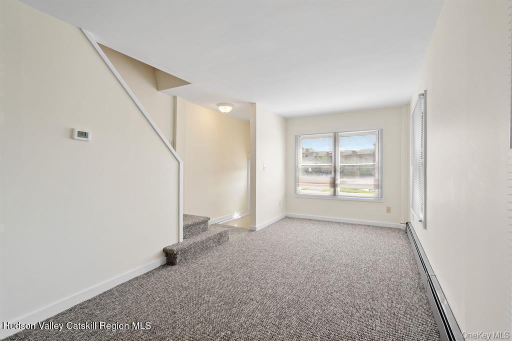 252-254 Partition Street Saugerties, NY 12477 - Photo 7 of 35 an empty room with windows