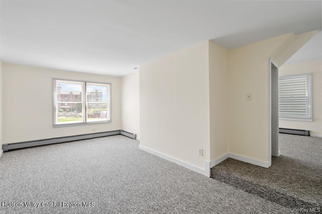 252-254 Partition Street Saugerties, NY 12477 - Photo 10 of 35 an empty room with windows