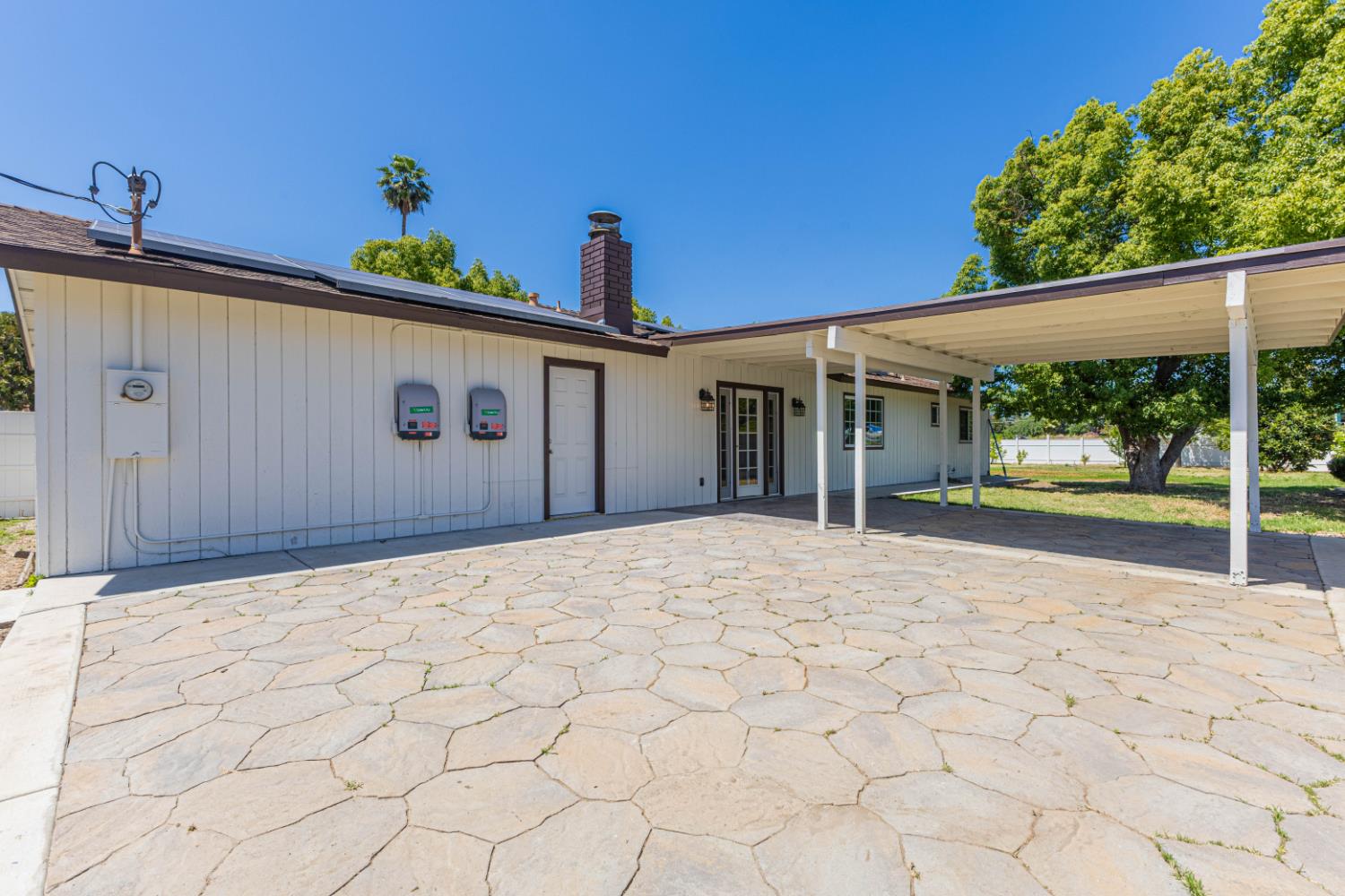 17925 Rodeo Drive Madera, CA 93638 - Photo 22 of 26 a front view of a house with a yard