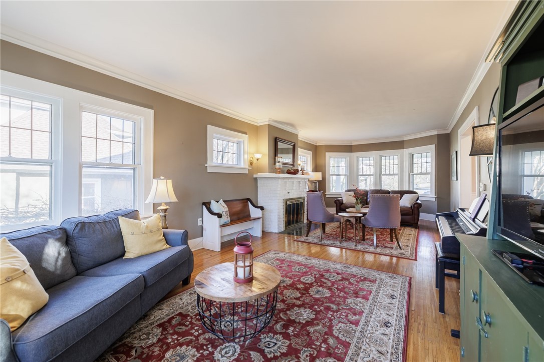 157 Sunset Drive Brighton, NY 14618 - Photo 13 of 32 Living Room with leaded glass windows
