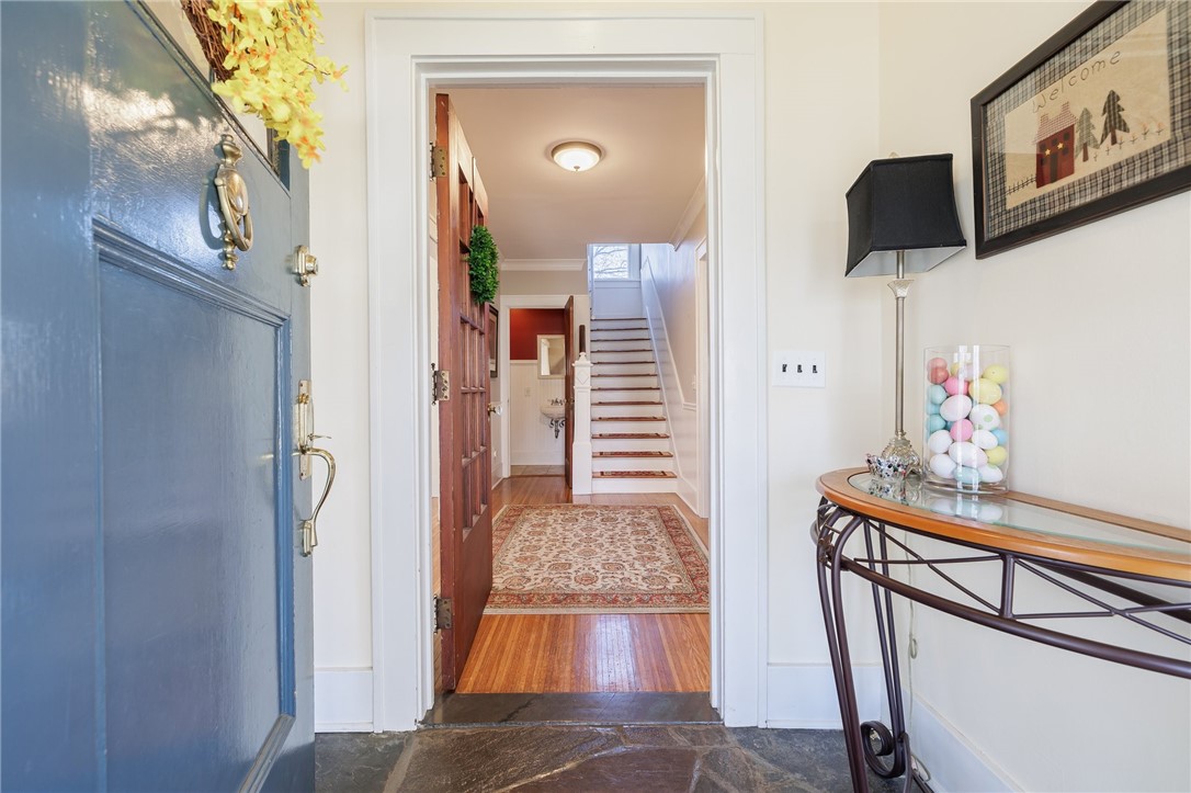 157 Sunset Drive Brighton, NY 14618 - Photo 6 of 32 Double foyer with slate flooring
