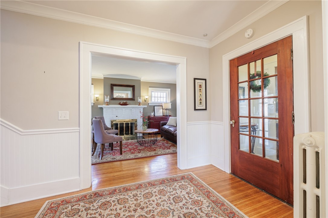 157 Sunset Drive Brighton, NY 14618 - Photo 9 of 32 Front Foyer w/ hardwood floors open to Living Room