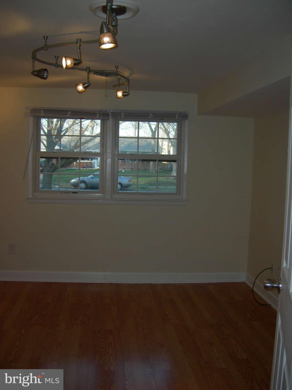 5218 Montgomery Street Springfield, VA 22151 - Photo 7 of 8 an empty room with a window