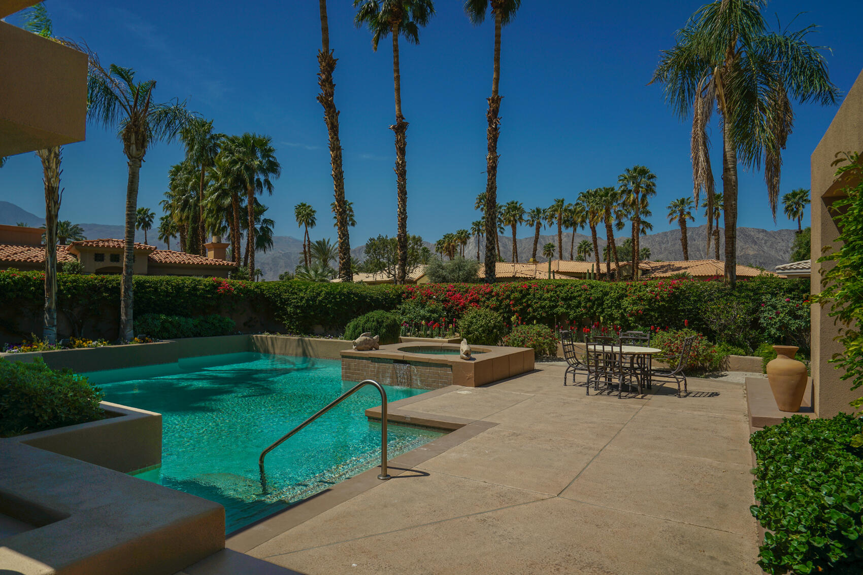 79140 Jack Rabbit Trail La Quinta, CA 92253 - Photo 11 of 61 a view of a backyard with sitting area