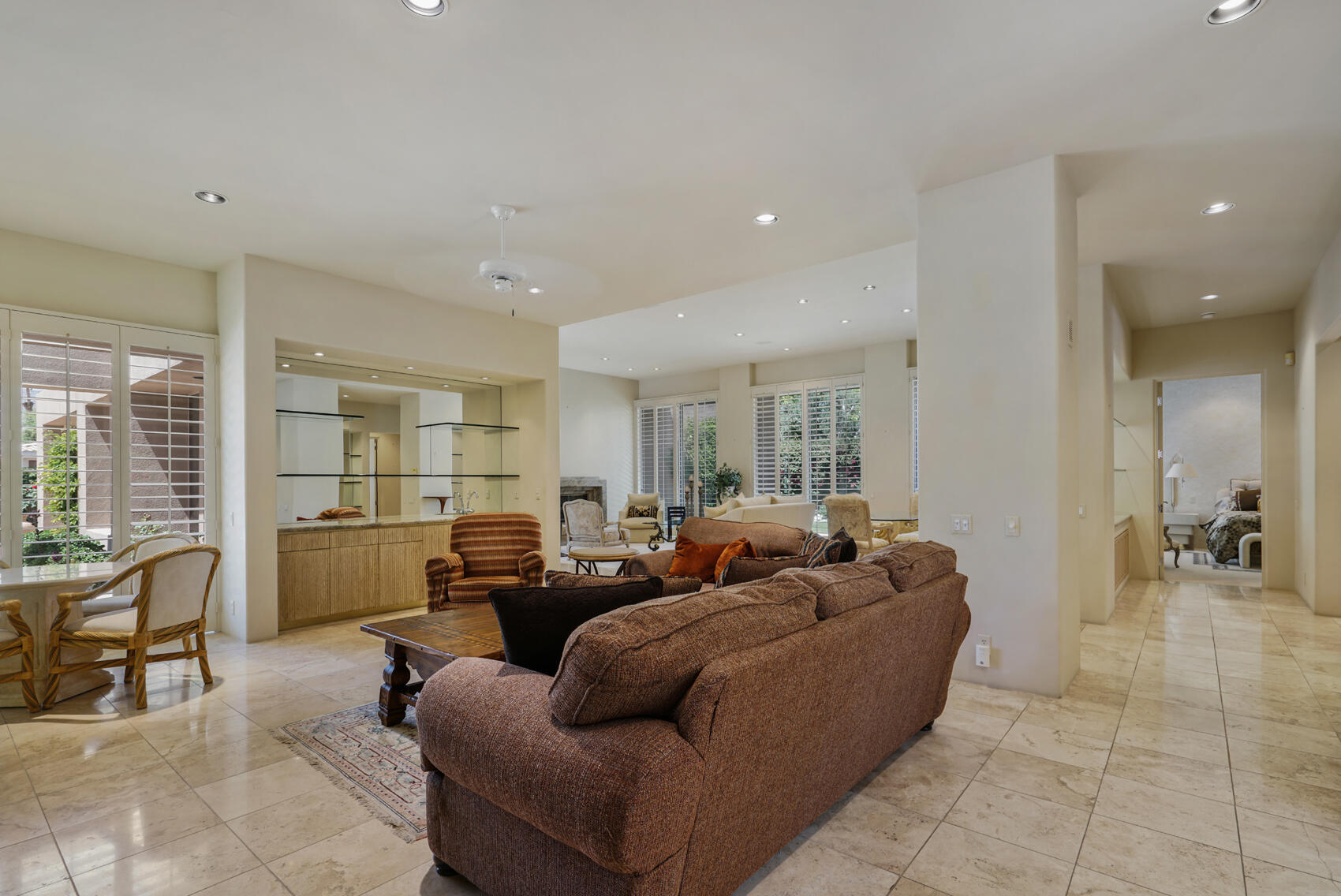 79140 Jack Rabbit Trail La Quinta, CA 92253 - Photo 27 of 61 a living room with furniture and a large window