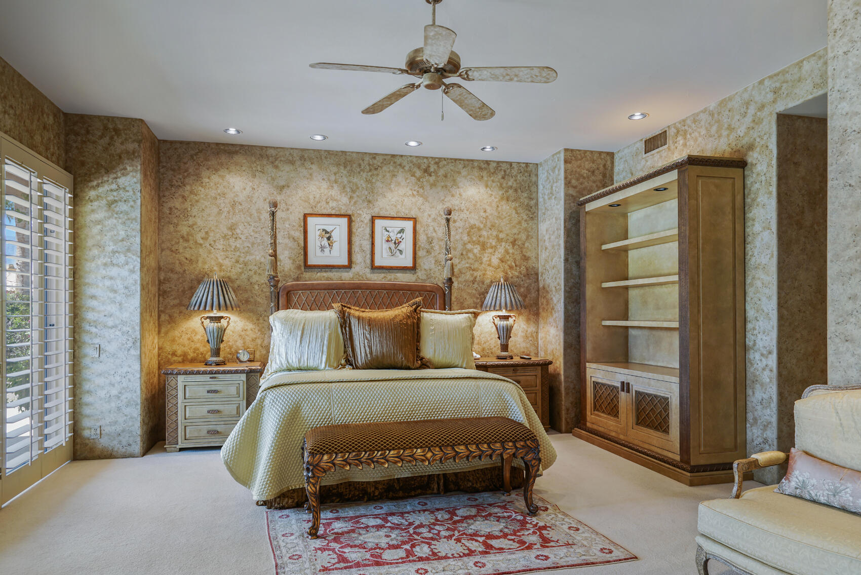 79140 Jack Rabbit Trail La Quinta, CA 92253 - Photo 37 of 61 a bedroom with a bed and a chandelier