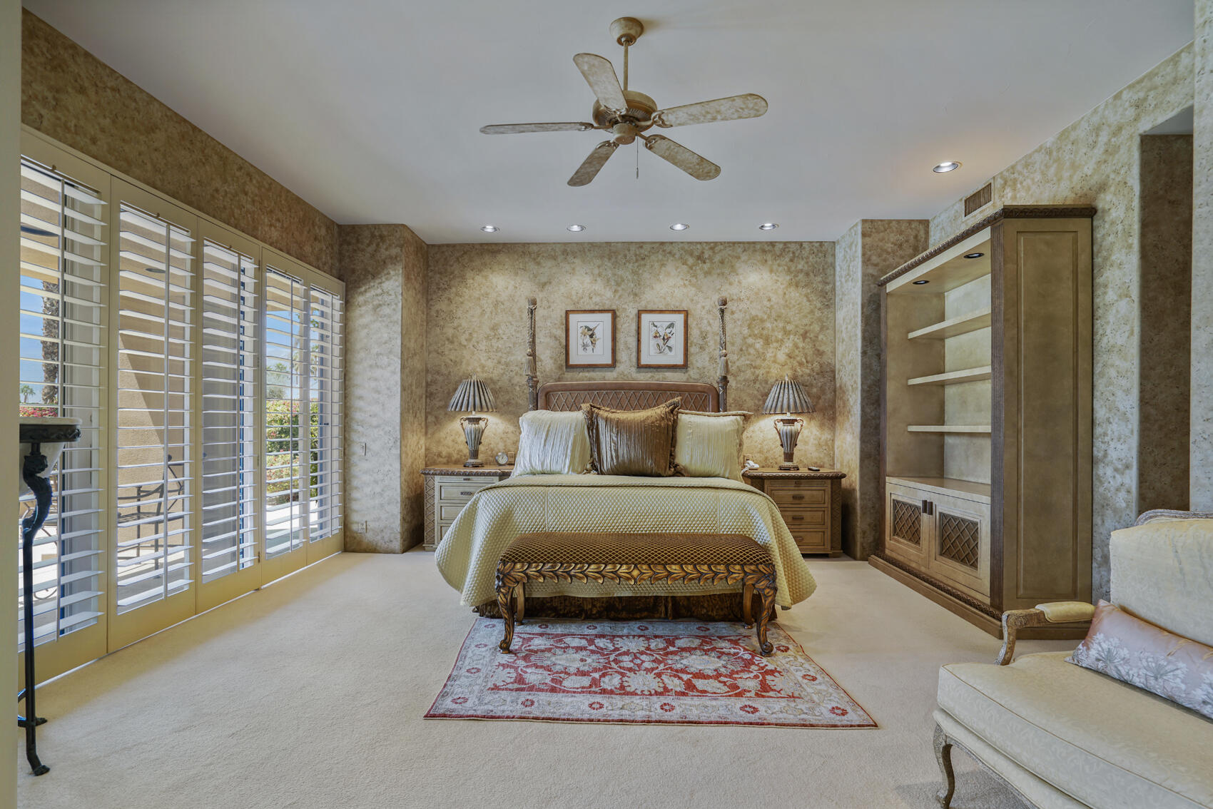 79140 Jack Rabbit Trail La Quinta, CA 92253 - Photo 40 of 61 a living room with a couch next to a large window