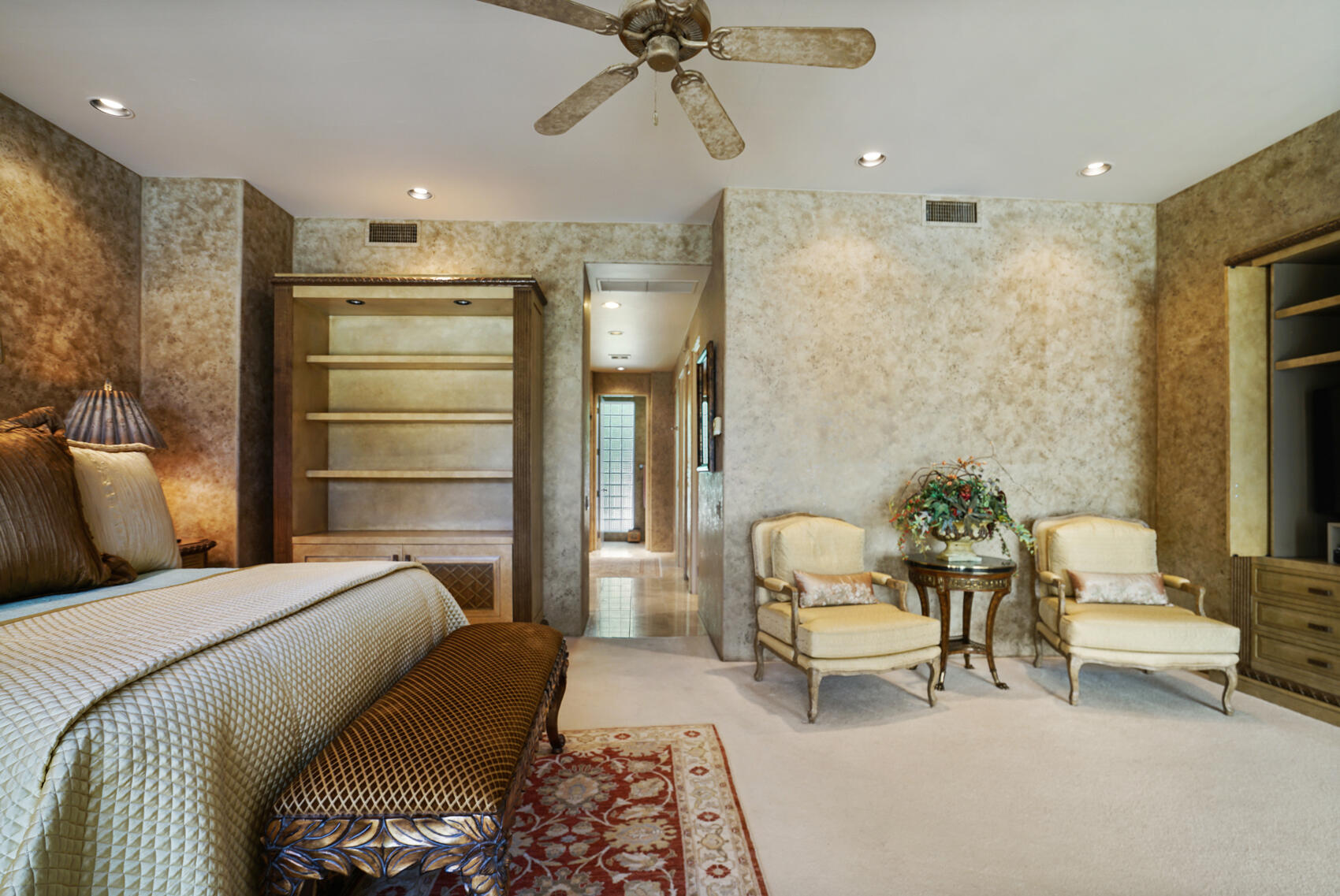 79140 Jack Rabbit Trail La Quinta, CA 92253 - Photo 42 of 61 a bedroom with a bed and a chandelier