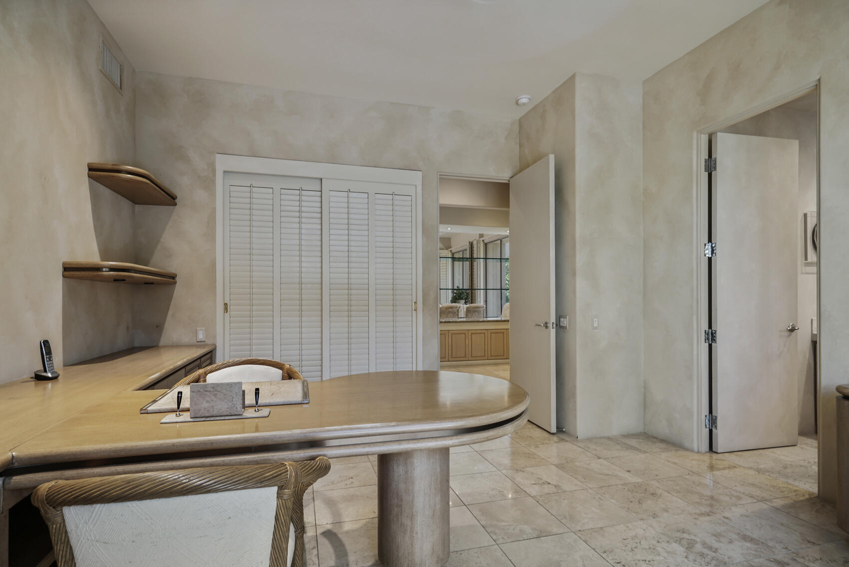 79140 Jack Rabbit Trail La Quinta, CA 92253 - Photo 47 of 61 a room with a table and chairs