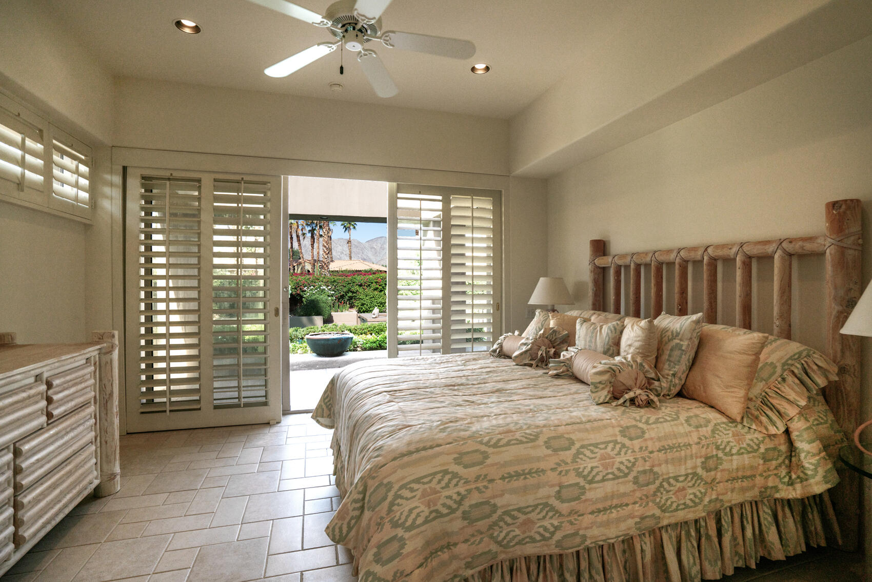 79140 Jack Rabbit Trail La Quinta, CA 92253 - Photo 52 of 61 a bed sitting in a spacious bedroom next to a window