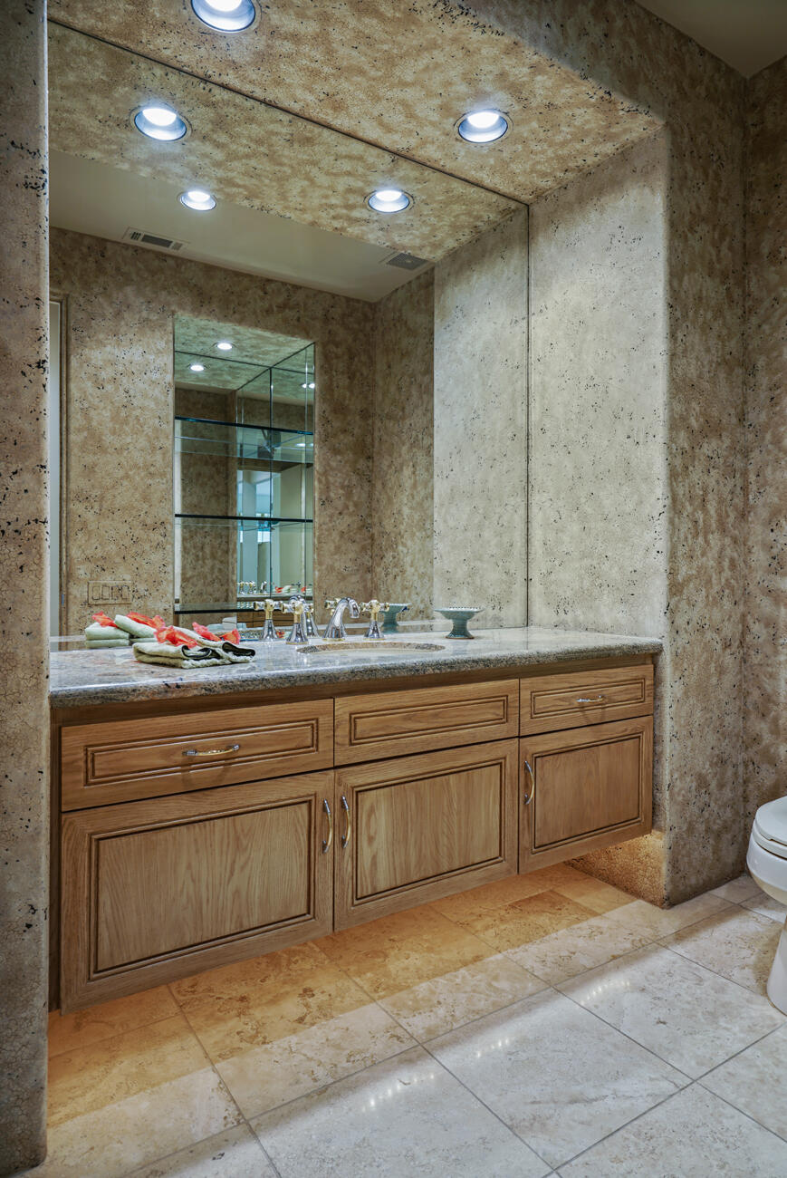 79140 Jack Rabbit Trail La Quinta, CA 92253 - Photo 56 of 61 a bathroom with a sink and mirror