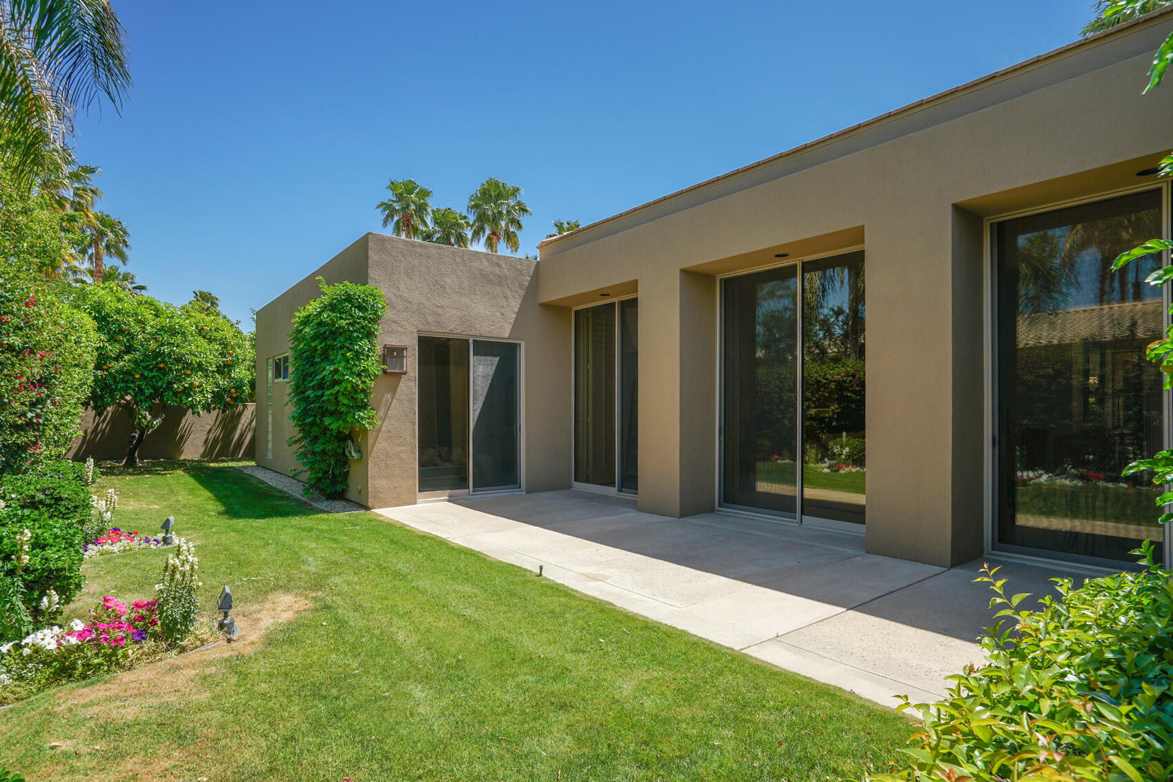 79140 Jack Rabbit Trail La Quinta, CA 92253 - Photo 59 of 61 a front view of a house with a yard