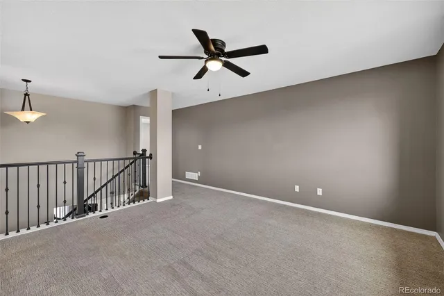 a spacious bedroom with a bed and a table