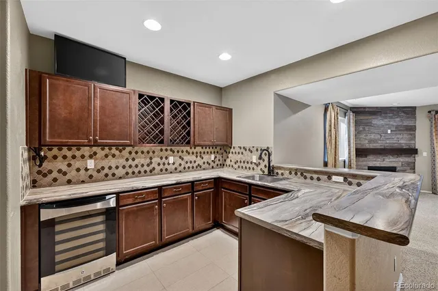an empty room with closet and wooden door