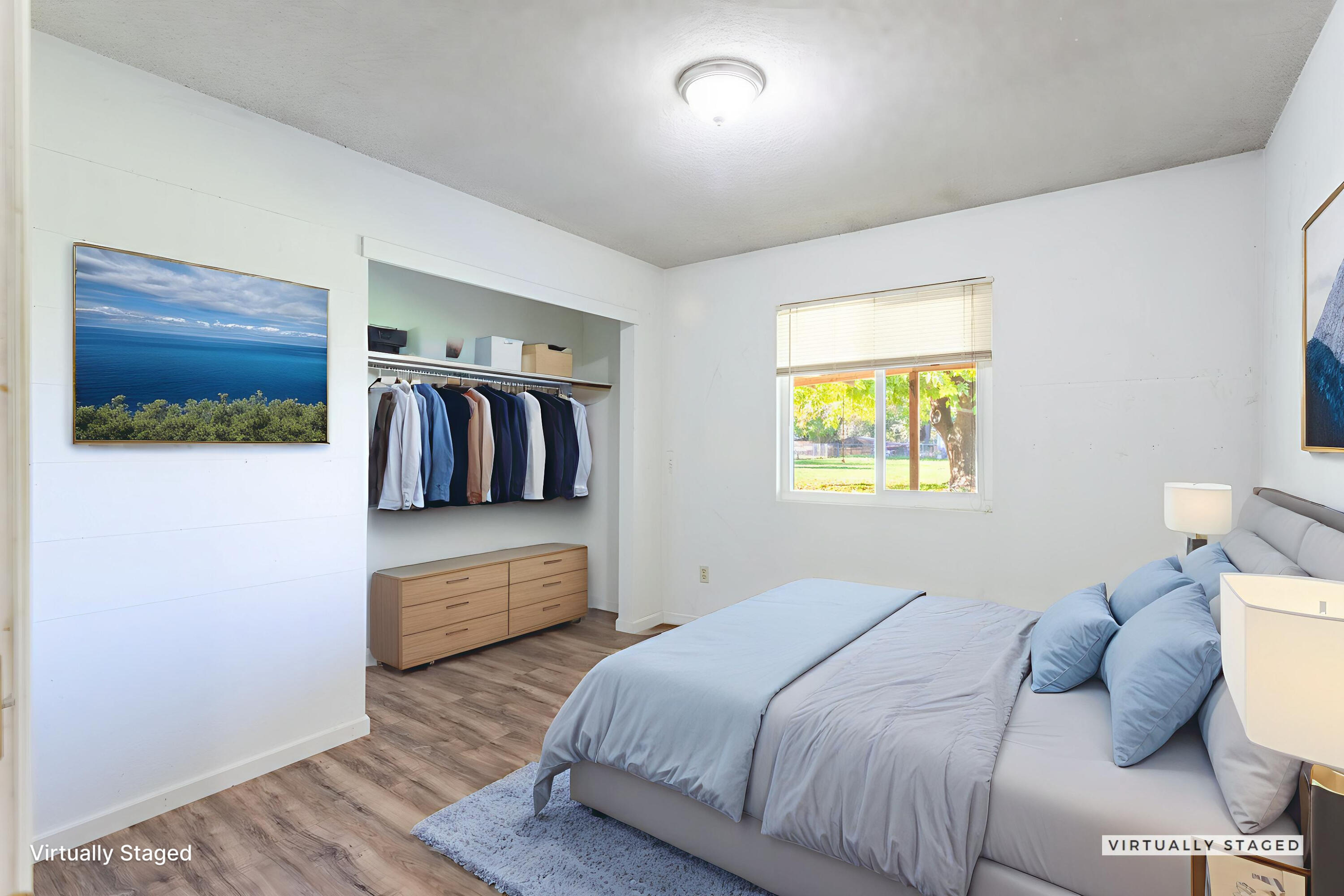 6874 Weeks Road Redding, CA 96002 - Photo 13 of 26 a bedroom with furniture and wooden floor