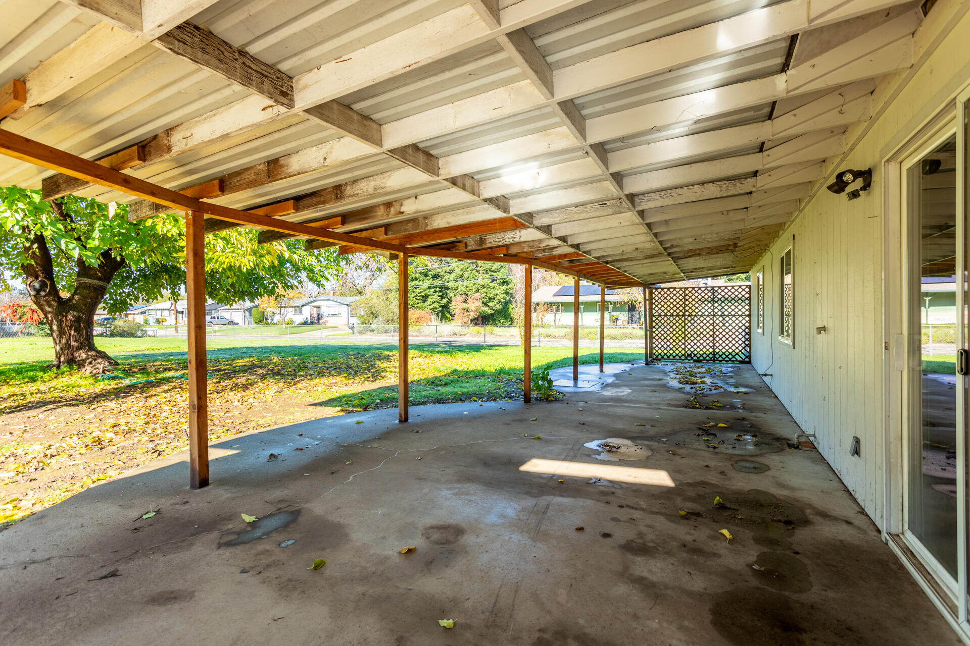 6874 Weeks Road Redding, CA 96002 - Photo 18 of 26 a view of a swimming pool with a porch