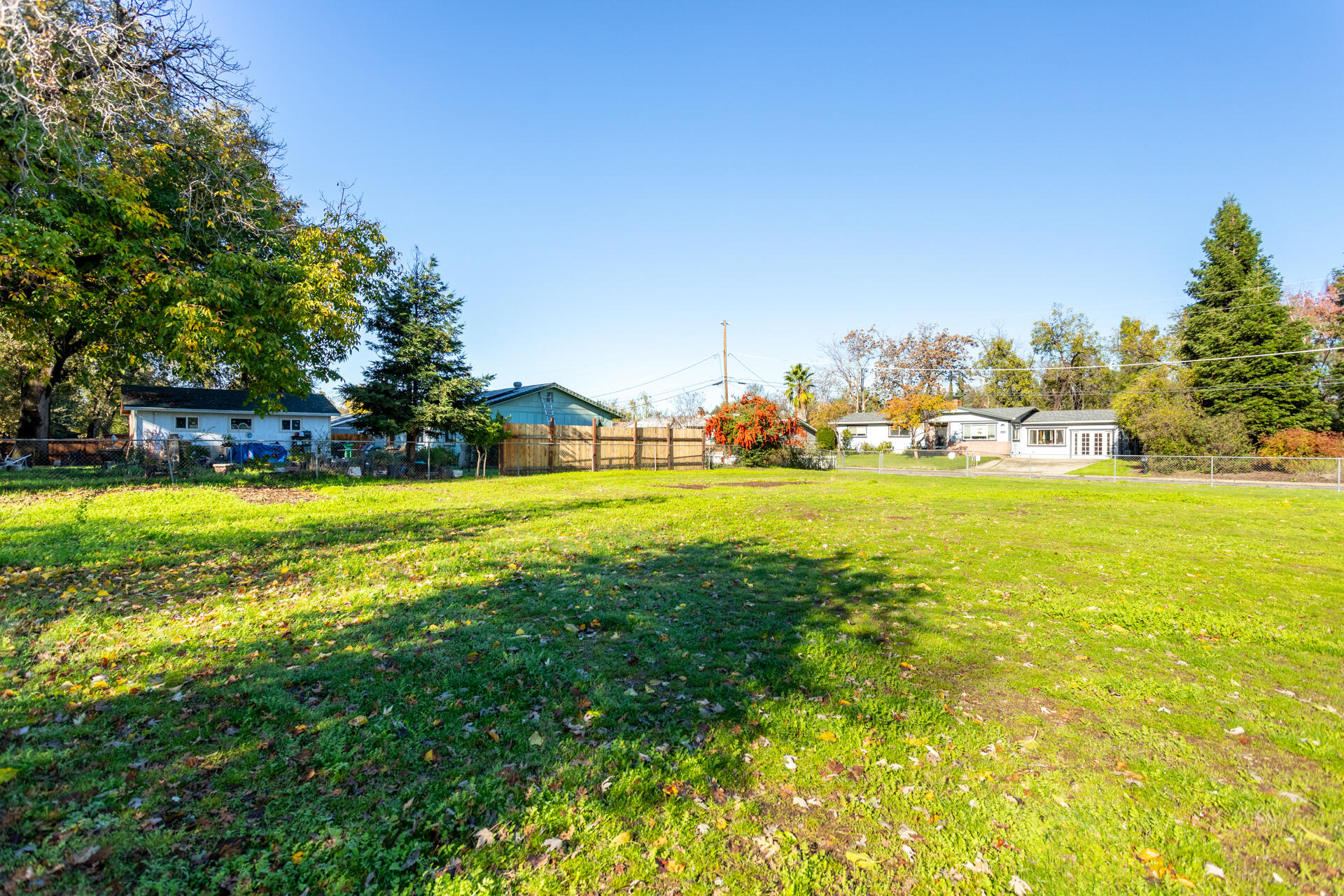 6874 Weeks Road Redding, CA 96002 - Photo 21 of 26 a view of a swimming pool with an outdoor space and seating area