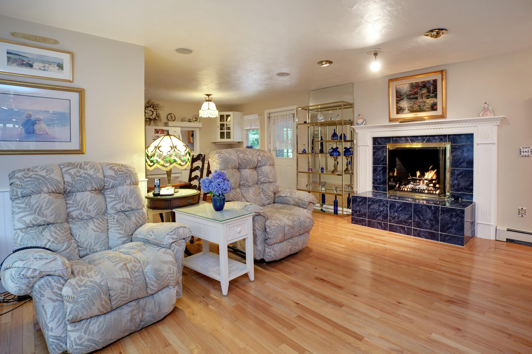 18 Frederick Road Falmouth, MA 02540 - Photo 20 of 62 a living room with furniture and a fireplace