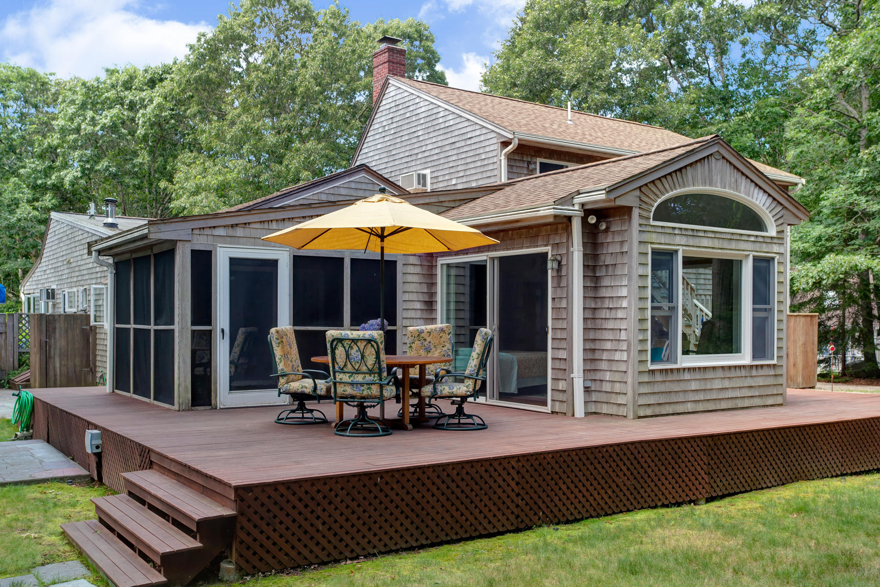 18 Frederick Road Falmouth, MA 02540 - Photo 22 of 62 a view of house with swimming pool and sitting area