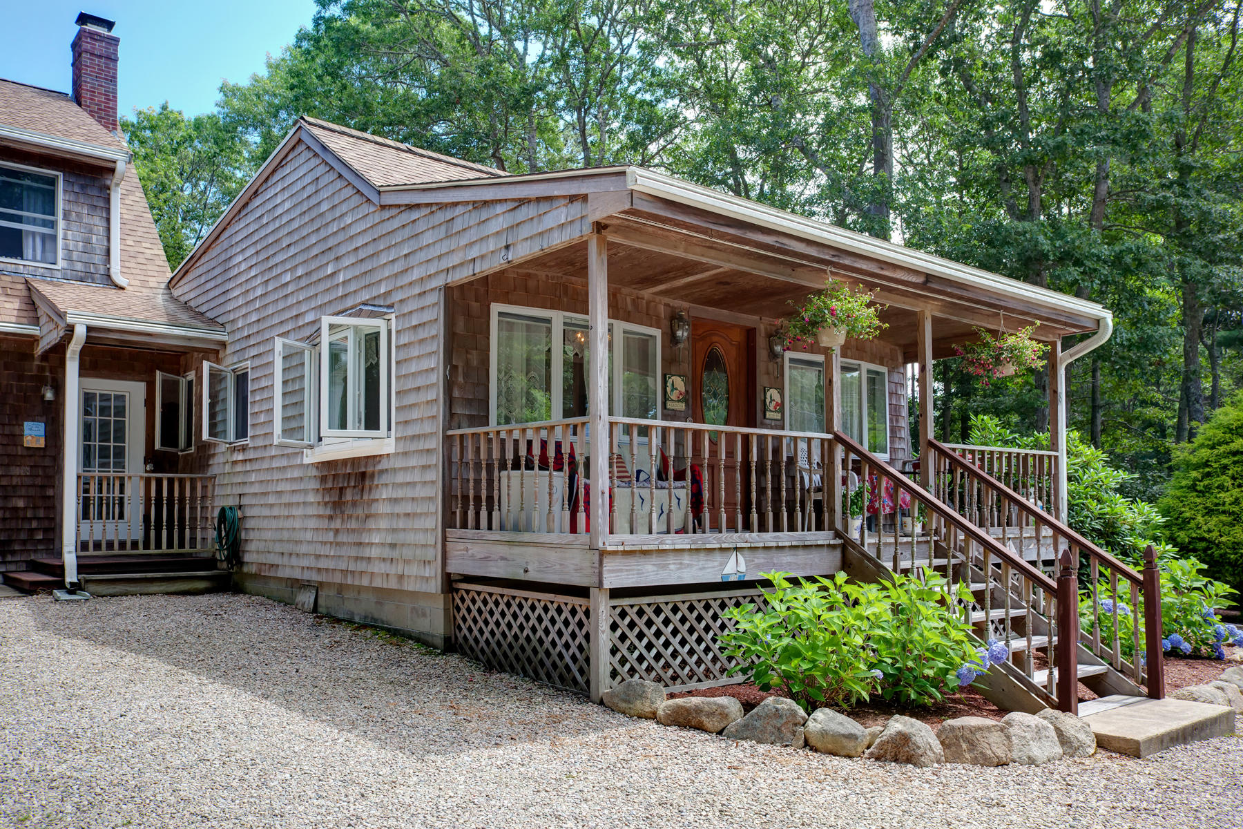 18 Frederick Road Falmouth, MA 02540 - Photo 25 of 62 a view of a house with a wooden deck and a yard