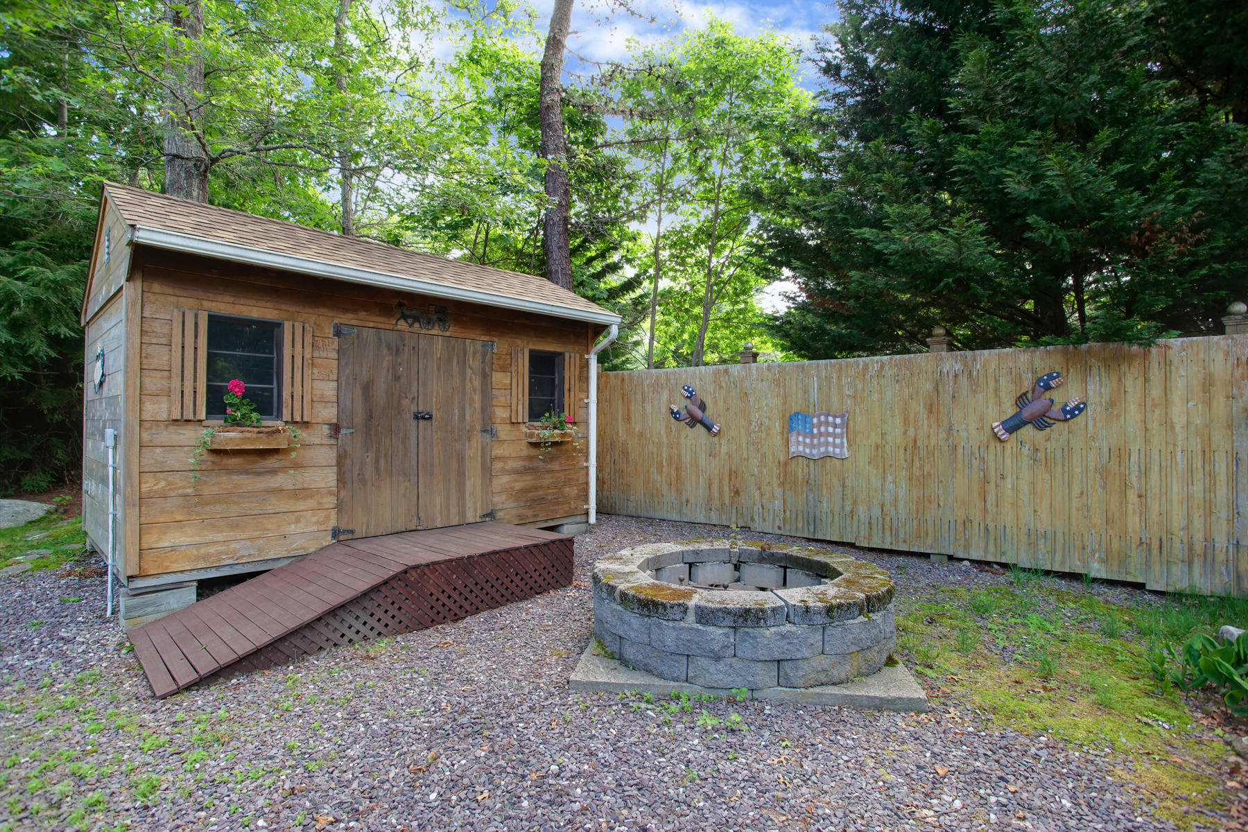 18 Frederick Road Falmouth, MA 02540 - Photo 29 of 62 a view of a backyard of the house