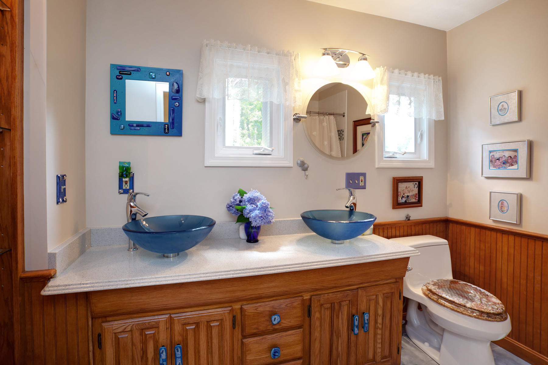 18 Frederick Road Falmouth, MA 02540 - Photo 43 of 62 a kitchen with a sink and a potted plant