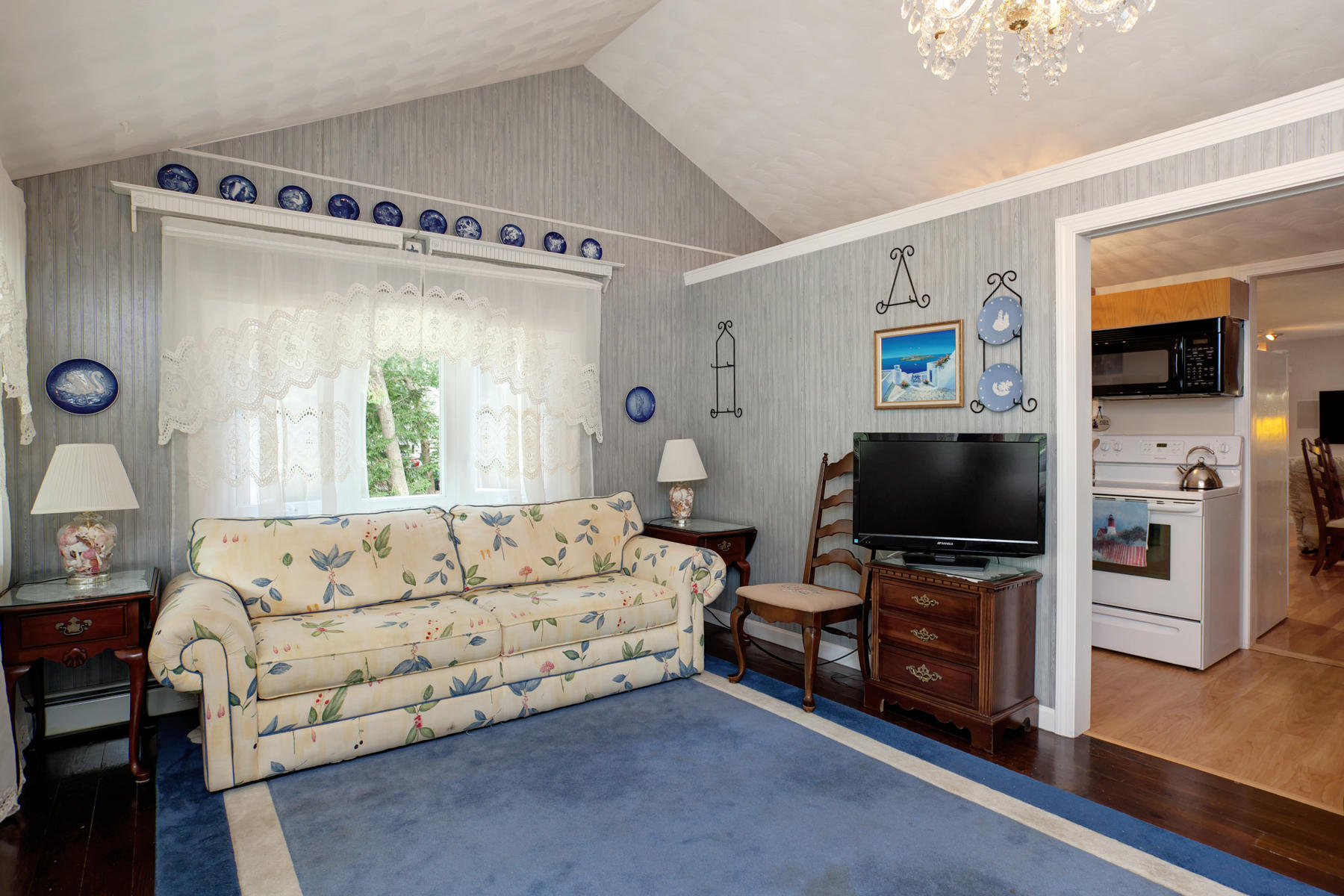 18 Frederick Road Falmouth, MA 02540 - Photo 45 of 62 a living room with furniture and a flat screen tv