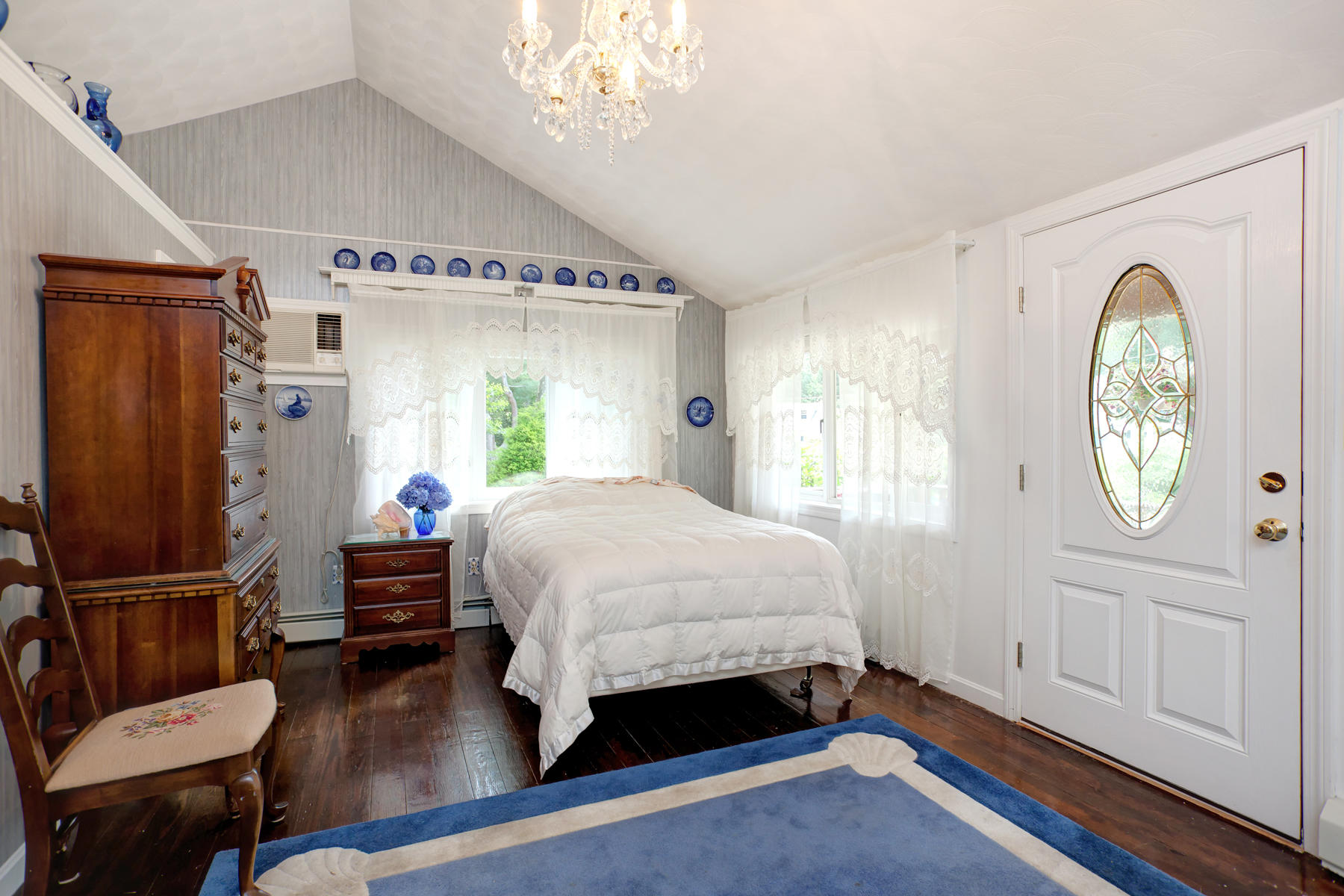 18 Frederick Road Falmouth, MA 02540 - Photo 47 of 62 a bed room with a bed mirror and a window