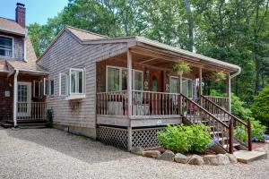 18 Frederick Road Falmouth, MA 02540 - Photo 62 of 62 a view of a house with a wooden deck and a yard