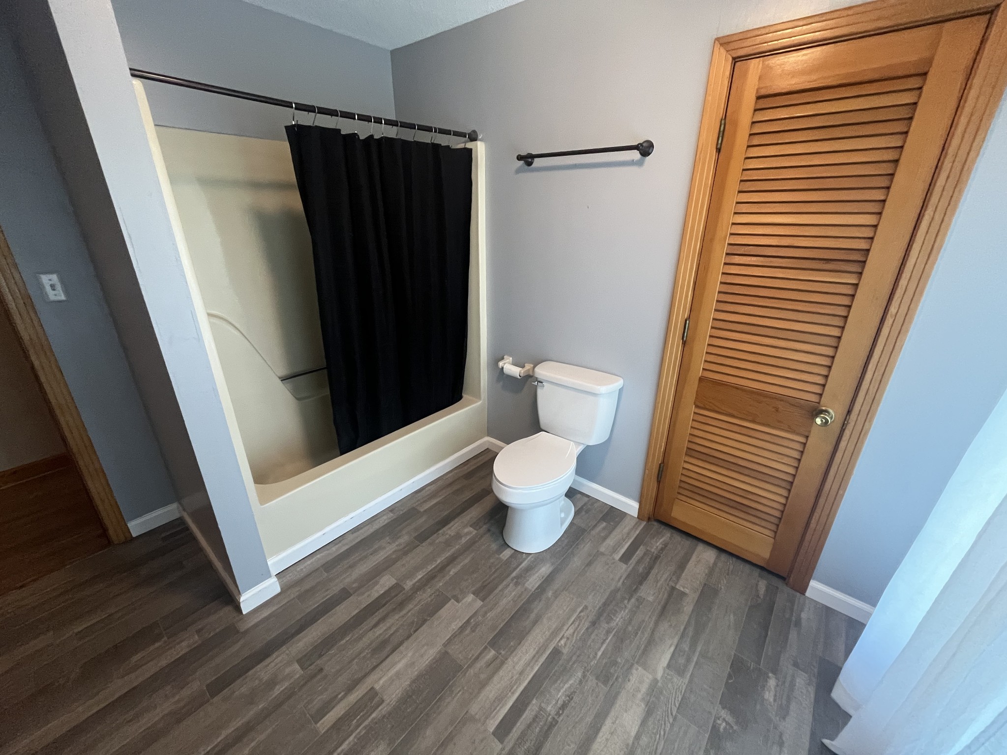 1619 Railroad Bed Road Collinwood, TN 38450 - Photo 15 of 54 a bathroom with a toilet and a shower