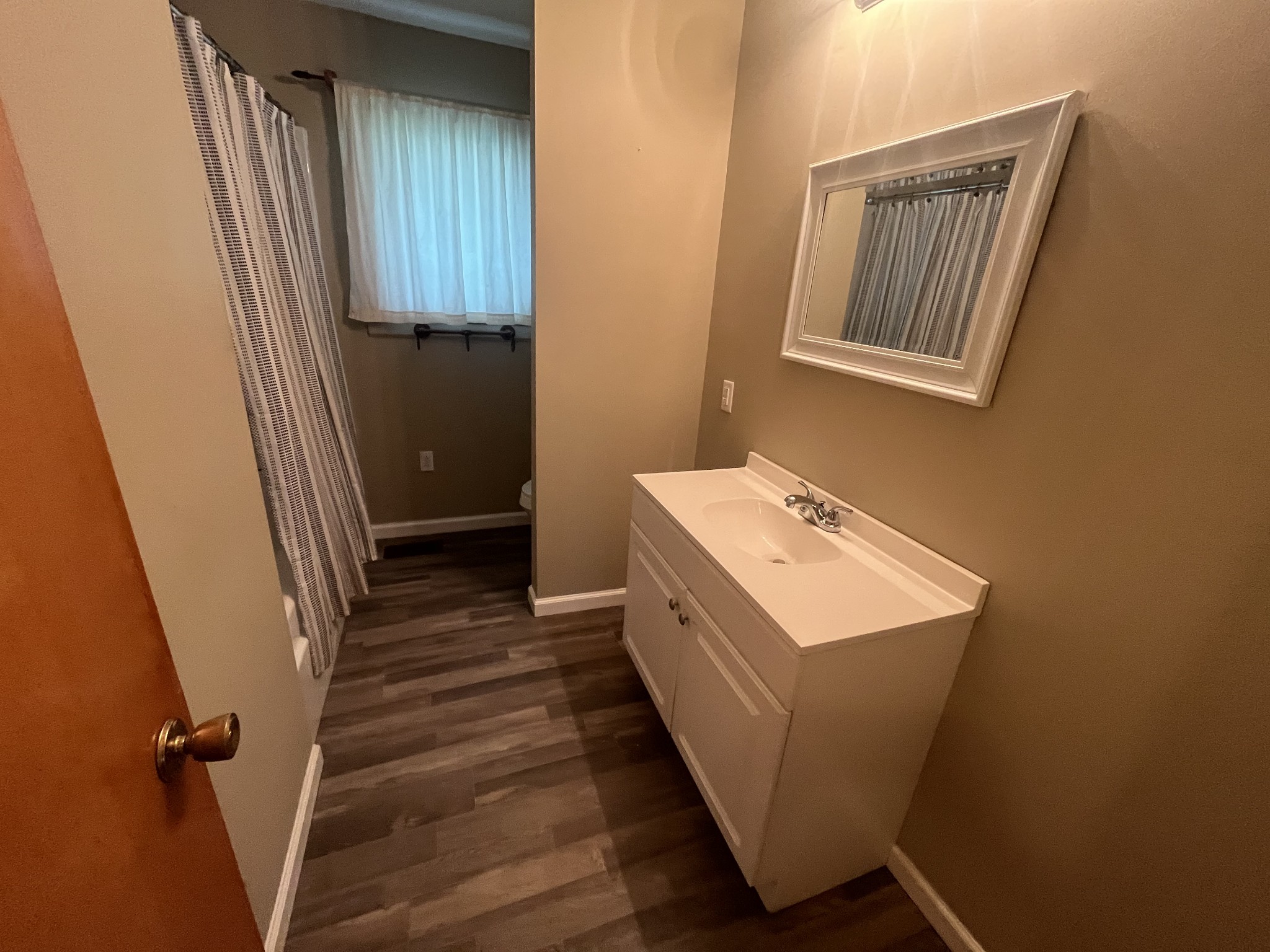 1619 Railroad Bed Road Collinwood, TN 38450 - Photo 16 of 54 a view of a hallway with washer and dryer