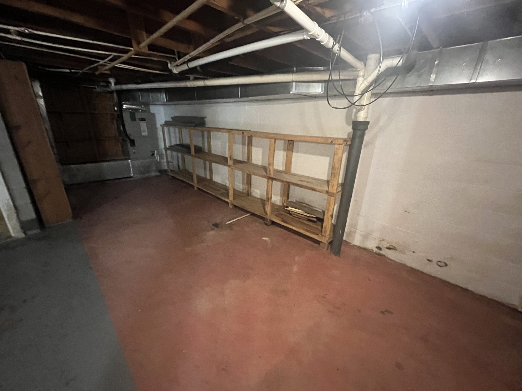 1619 Railroad Bed Road Collinwood, TN 38450 - Photo 36 of 54 a view of an empty room with a garage