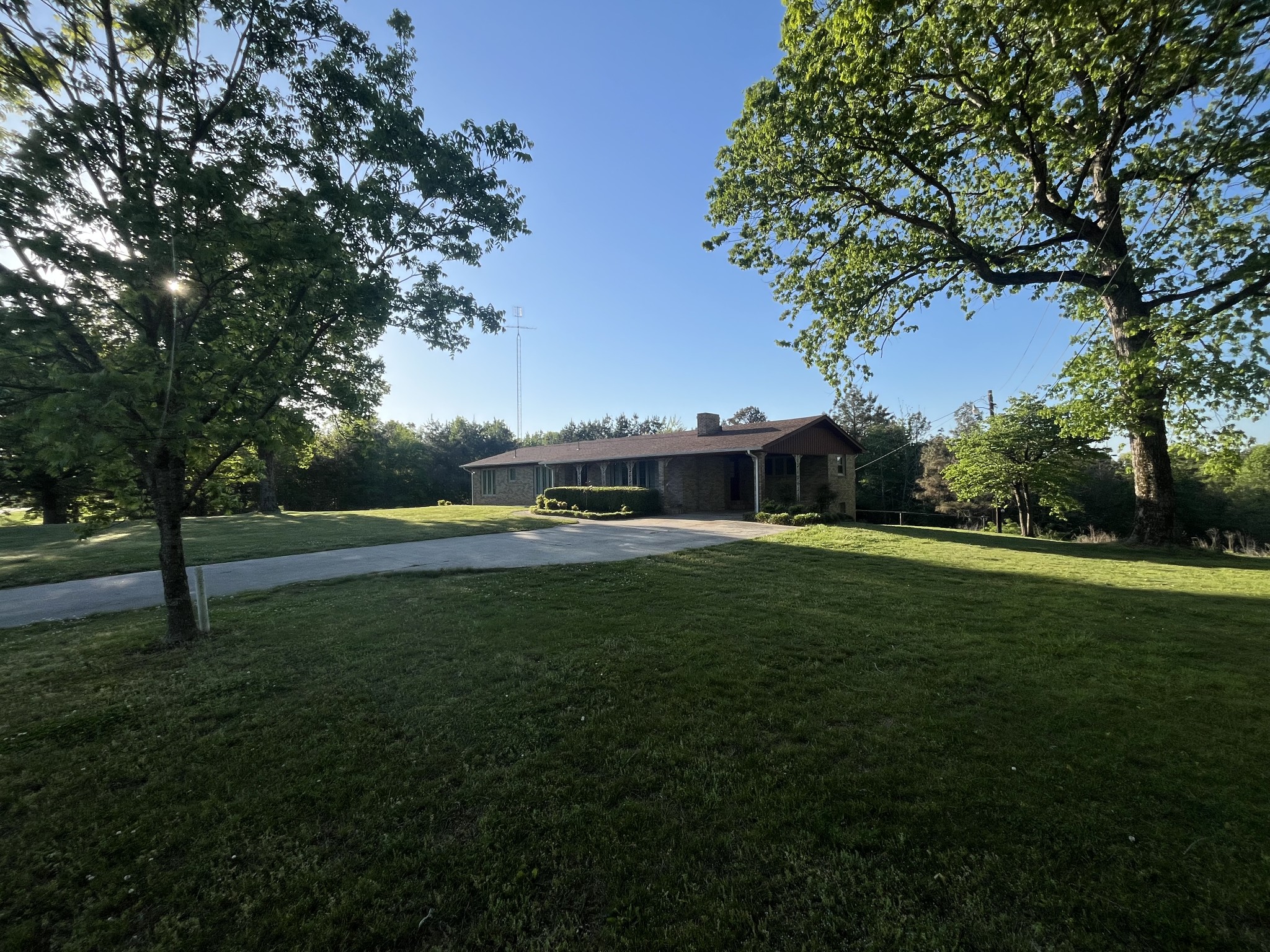 1619 Railroad Bed Road Collinwood, TN 38450 - Photo 50 of 54 a view of house with garden space and trees