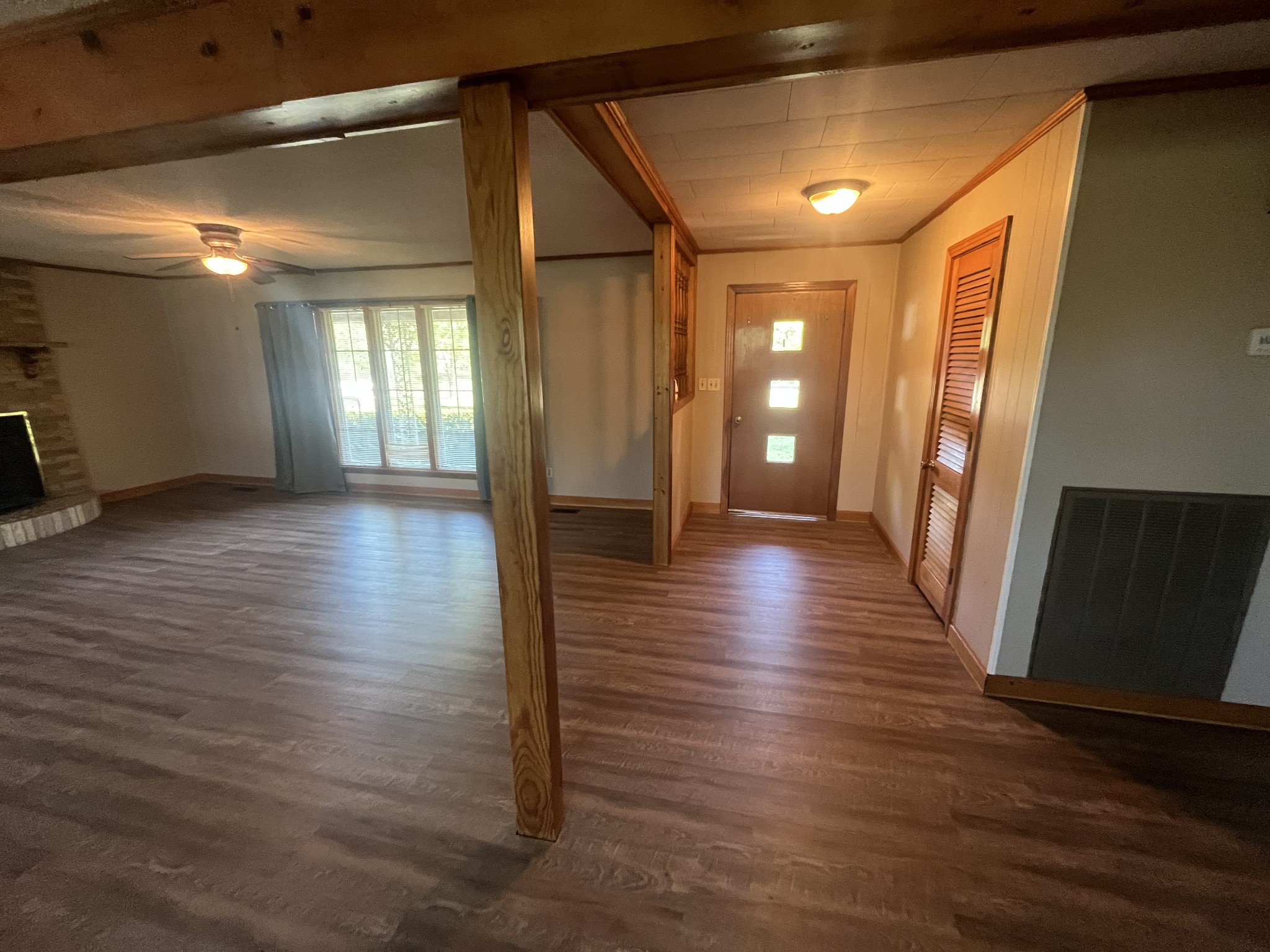 1619 Railroad Bed Road Collinwood, TN 38450 - Photo 8 of 54 a view of a hallway with wooden floor