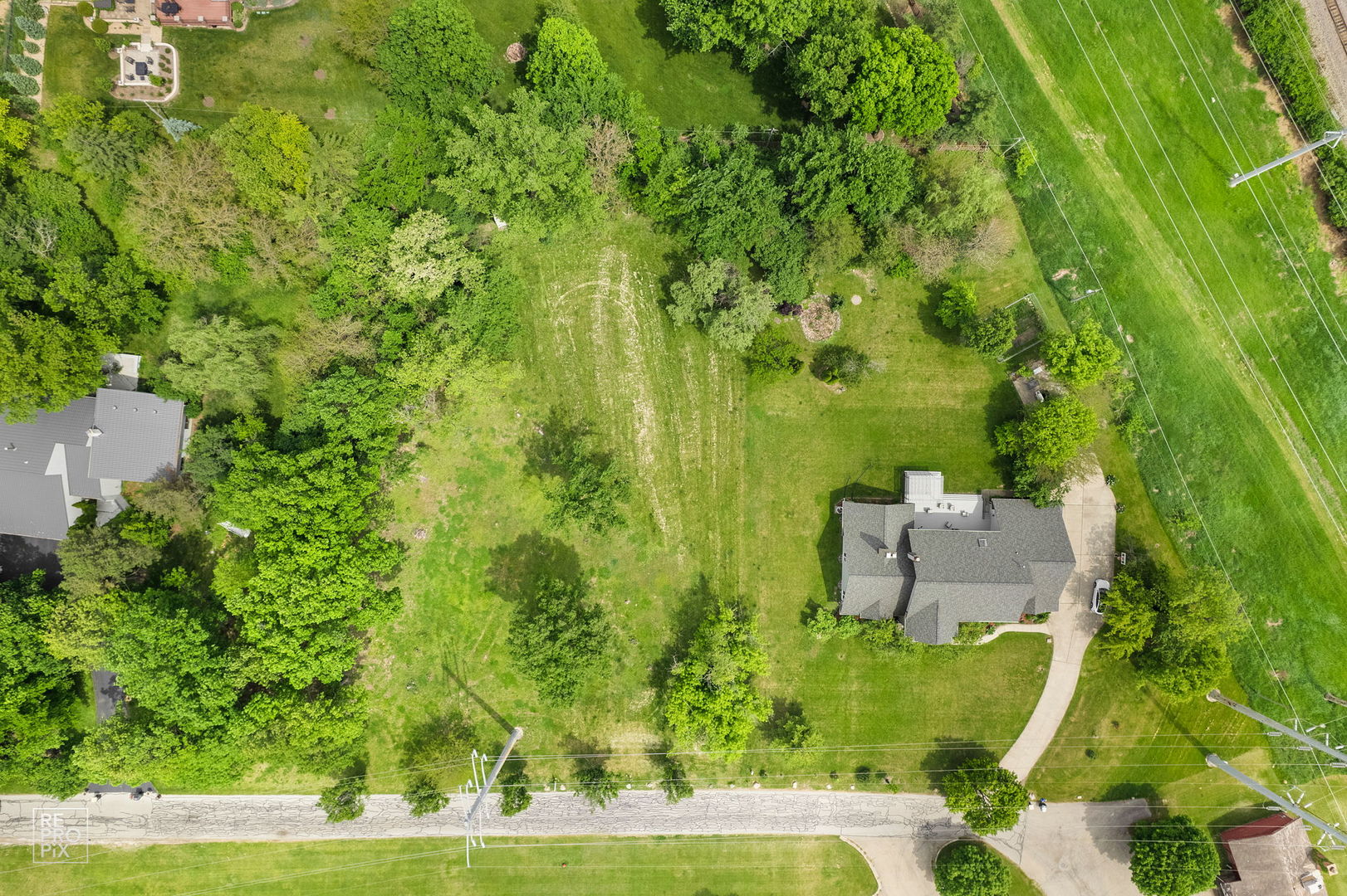 10S641 South Garfield Street Burr Ridge, IL 60527 - Photo 15 of 15 a view of a lake with outdoor space