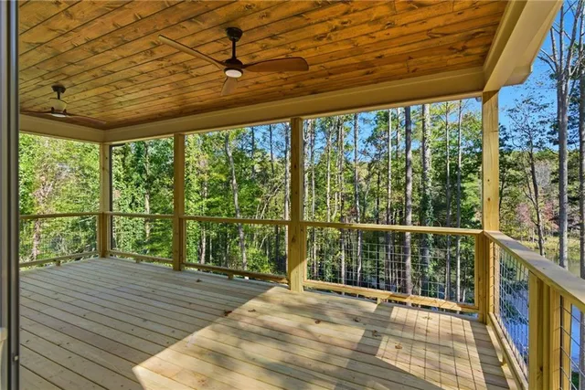 a bathroom with a double vanity sink toilet and a mirror