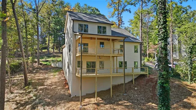 an aerial view of residential house with outdoor space