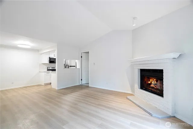 a view of a livingroom with a fireplace