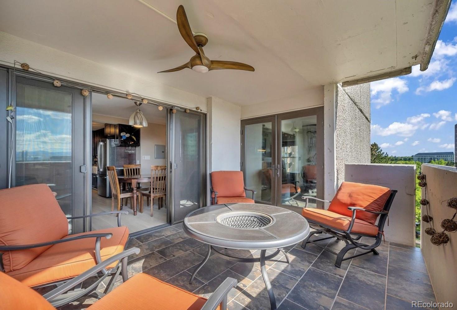 2 Adams Street, Unit 705 Denver, CO 80206 - Photo 35 of 50 a outdoor space with a table and chairs