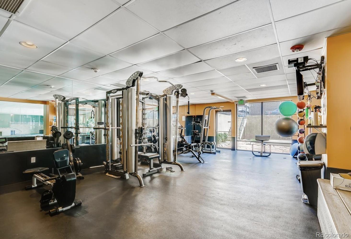 2 Adams Street, Unit 705 Denver, CO 80206 - Photo 44 of 50 a view of a room with gym equipment