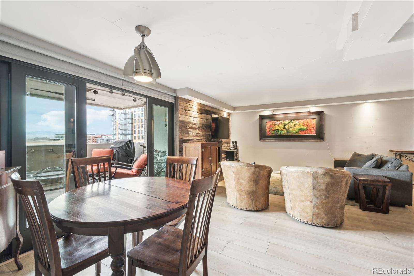 2 Adams Street, Unit 705 Denver, CO 80206 - Photo 8 of 50 a view of a dining room with furniture window and outside view