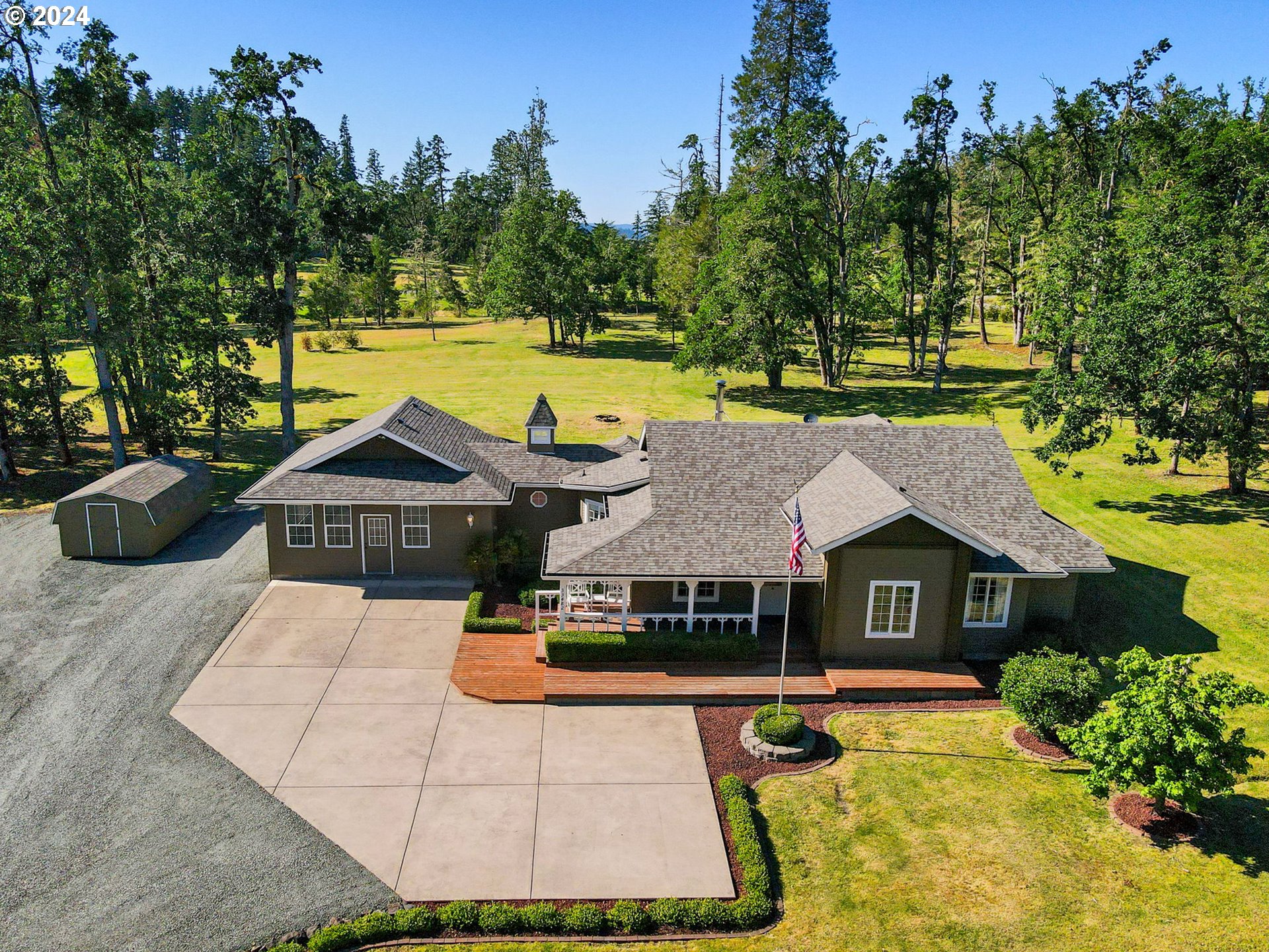 33482 Molitor Ranch Road Cottage Grove, OR 97424 - Photo 3 of 48 a aerial view of a house with swimming pool and big yard