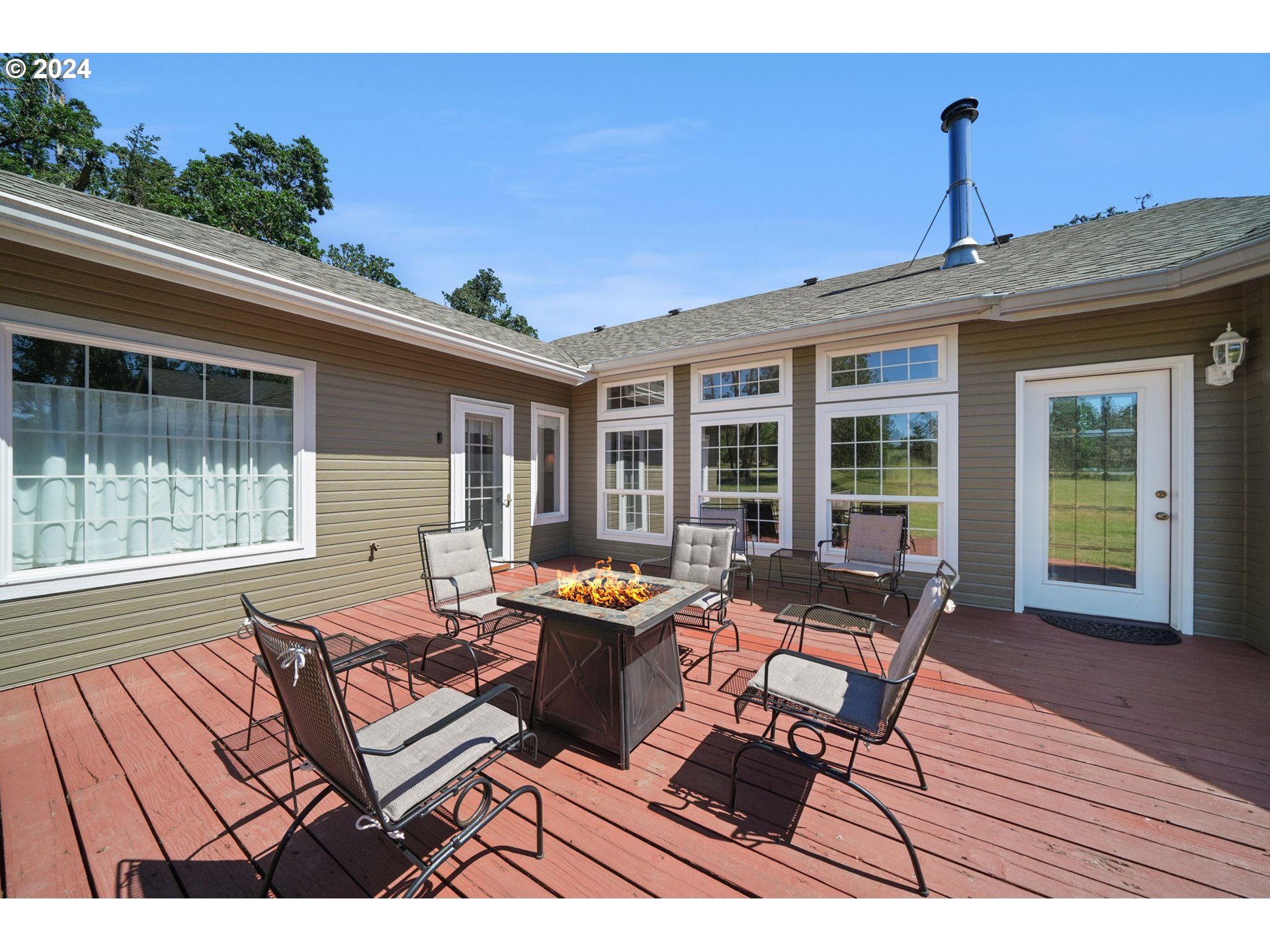 33482 Molitor Ranch Road Cottage Grove, OR 97424 - Photo 39 of 48 a outdoor living space with furniture and garden view