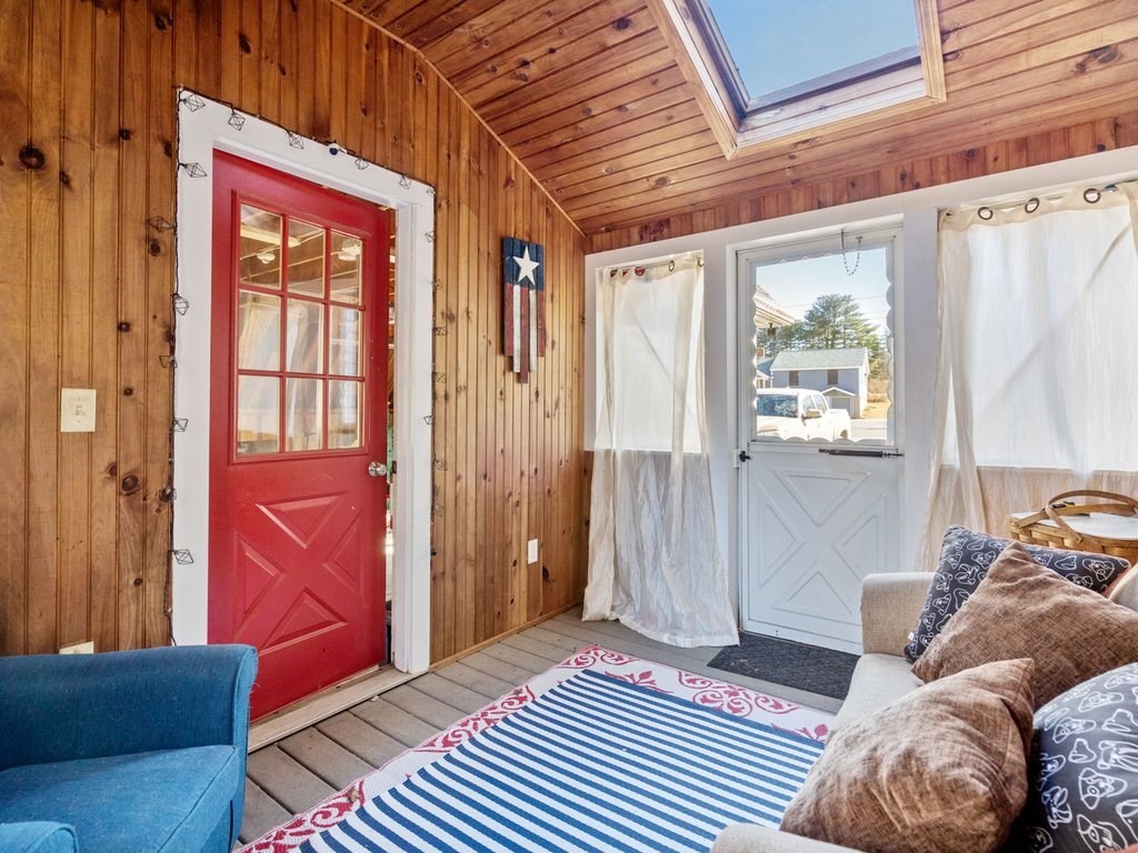 62 Middle Road Amesbury, MA 01913 - Photo 20 of 24 a bedroom with a bed and a window