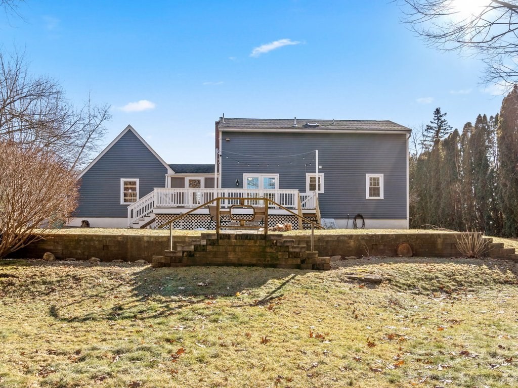 62 Middle Road Amesbury, MA 01913 - Photo 22 of 24 a front view of a house with a yard