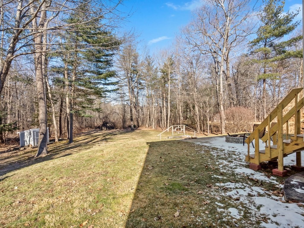 62 Middle Road Amesbury, MA 01913 - Photo 23 of 24 a view of a yard with trees